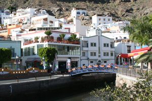 Puerto de Mogan bridge over river to old village 